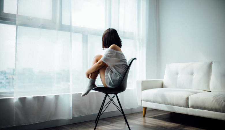 woman sitting on chair